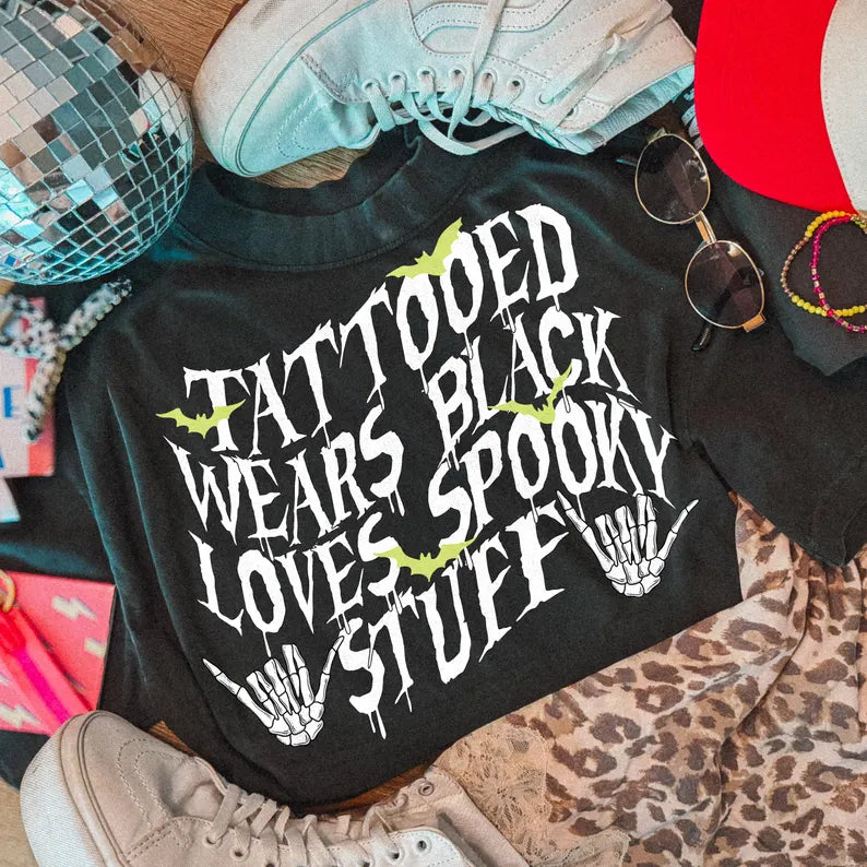 tattooed wears black loves spooky stuff